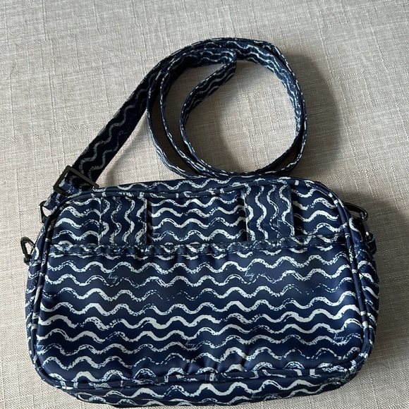 Lightly used Lug Carousel crossbody bag. Adjustable strap expands up to 26”. - Picture 6 of 6